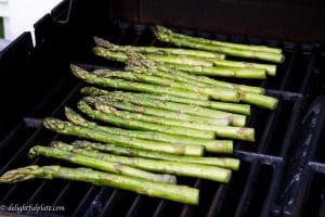 grilled asparagus eaten with grilled opah