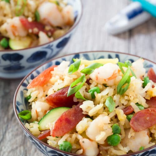 This Shrimp and Chinese Sausage Fried Rice comes together in 20 minutes. So quick and easy! Recipe and tips for making fried rice are on delightfulplate.com.