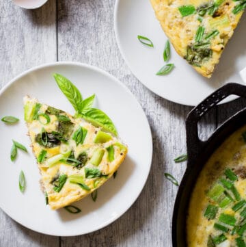 This luscious Vietnamese Frittata features eggs, ground pork, onion and basil. It's so quick and easy to make. You only need one cast iron skillet to cook it.
