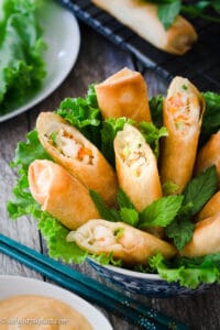 These Vietnamese mayo seafood spring rolls are delicious and crispy with piping hot filling that includes crab meat, shrimp and mayo. Serve with spicy mayo dip, lettuce and mint, and they will disappear quickly.