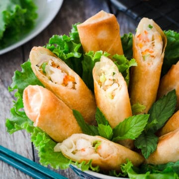 These Vietnamese mayo seafood spring rolls are delicious and crispy with piping hot filling that includes crab meat, shrimp and mayo. Serve with spicy mayo dip, lettuce and mint, and they will disappear quickly.