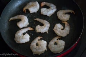 Cook shrimp for the filling of Vietnamese crepes (Banh Xeo)