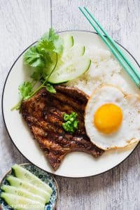 These grilled pork chops are full of sweet and savory flavors and infused with lemongrass fragrance. This is one of the easiest Vietnamese restaurant dishes to make at home.