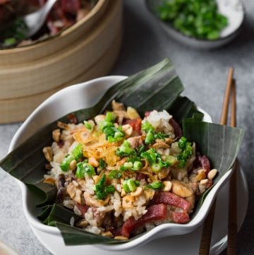 This flavorful steamed chicken sticky rice features soft-chewy sticky rice, chicken, shiitake mushrooms and sweet sausages (lap cheong). Everything is cooked together in a bamboo steamer and then served with popular toppings for savory sticky rice.