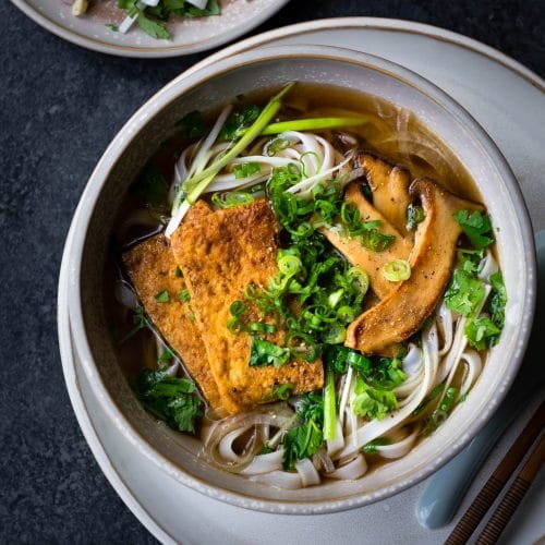This Vietnamese Vegan Pho Noodle Soup takes just an hour to cook, and it is just as hearty, flavorful and delicious as regular beef pho noodle soup.