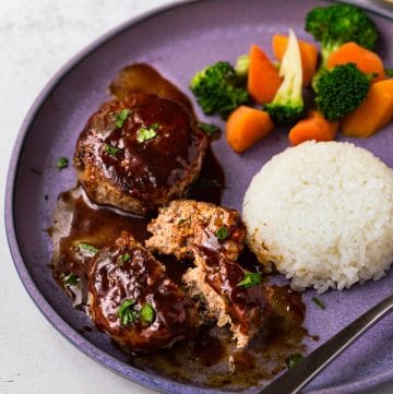 Japanese Hamburg Steak (Hambagu) is one of the easiest Japanese dishes to cook at home. The meatballs are juicy, tender and served with a tasty ketchup-based sauce. Serve with rice and steamed vegetables.