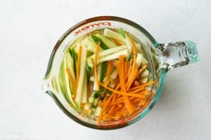 a container of pickled vegetables