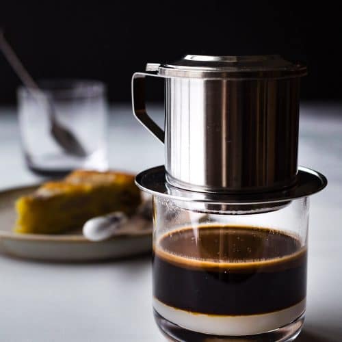 Vietnamese Coffee (Cafe Sua Nong) is a popular beverage drink in Vietnam. Learn how to make it the traditional way with a phin coffee filter.