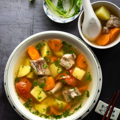 This Vietnamese Pork Rib Soup with Potatoes and Carrots (Canh Suon Khoai Tay Ca Rot) features tender pork ribs, potatoes, carrots with a clear and savory broth. Made with simple, easy to find and affordable ingredients, this soup is so comforting and fulfilling.
