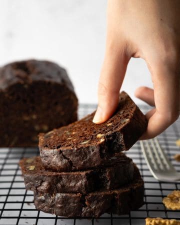 This Chocolate Walnut Banana Bread is so delicious, moist and tender with a chocolatey flavor, crunchy nuts and wonderful aroma. Either as breakfast or dessert, it will make you feel cozy and heartwarming. Super easy to make at home!