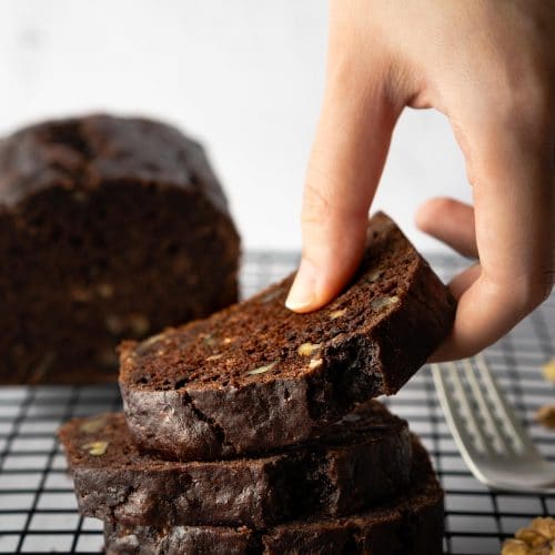 This Chocolate Walnut Banana Bread is so delicious, moist and tender with a chocolatey flavor, crunchy nuts and wonderful aroma. Either as breakfast or dessert, it will make you feel cozy and heartwarming. Super easy to make at home!