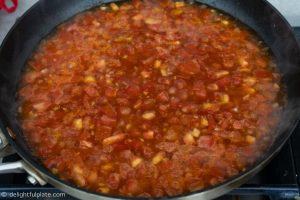 Making tomato sauce for Vietnamese meatball banh mi (banh mi xiu mai)
