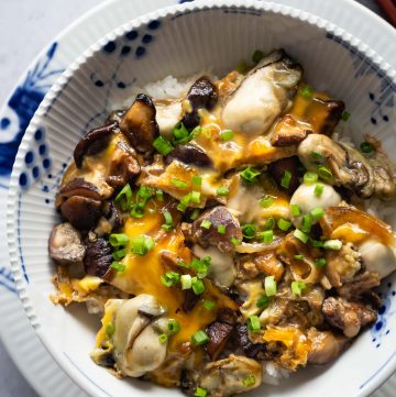 This Mushroom Oyster Rice Bowl (Oyster Donburi) features sweet and plump oysters and earthy shiitake mushrooms, simmered in an umami sauce and then served with fluffy steamed rice. A delicious, easy and healthy one-bowl meal that comes together in less than 30 minutes.