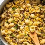 This delicious mushroom corn pasta features earthy mushrooms, charred corn, and a light cream sauce. It is a quick, easy and satisfying meatless pasta dish you can throw together in 30 minutes.