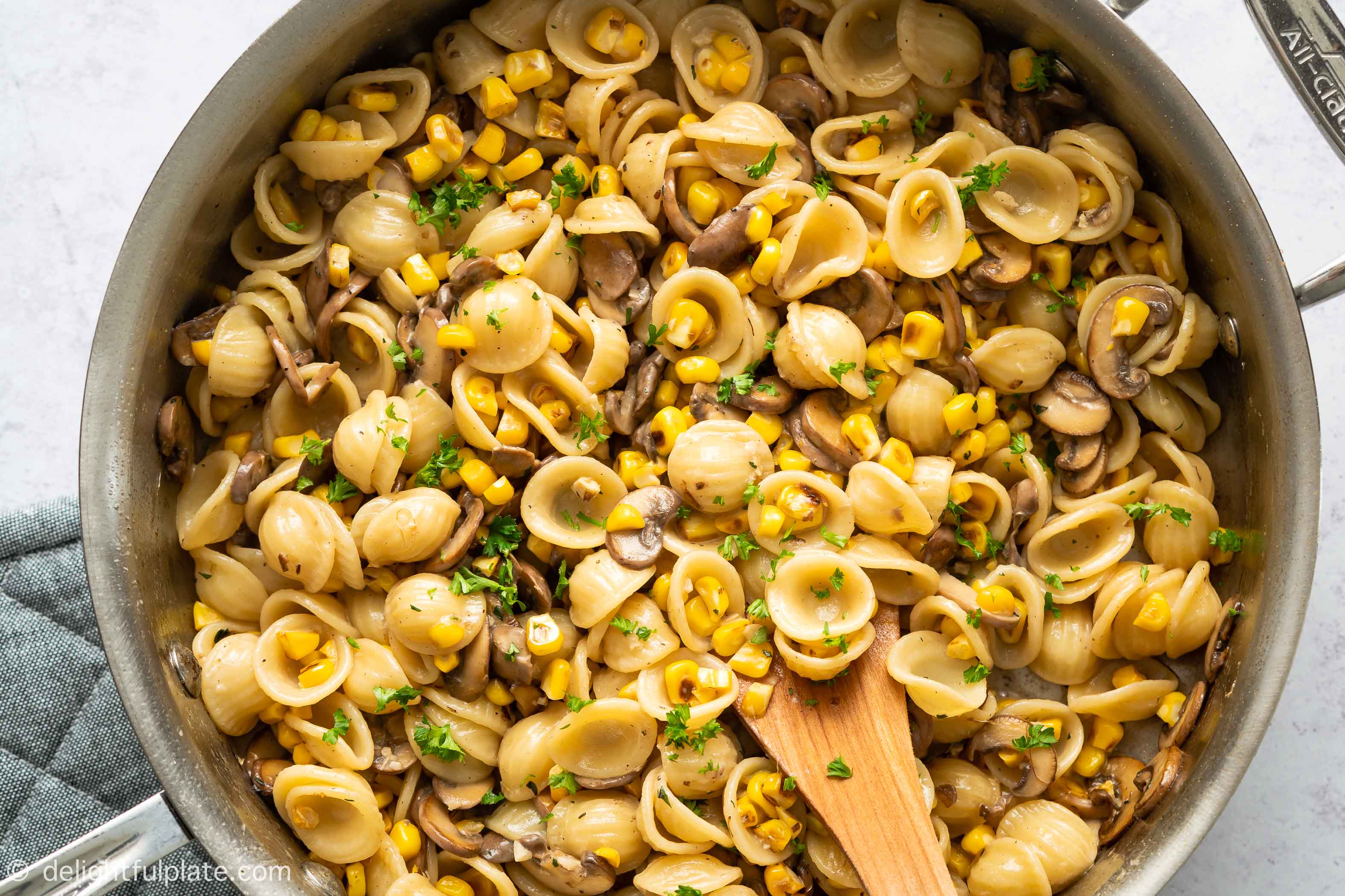 a pan of mushroom corn pasta
