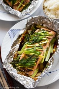 Moist and juicy salmon on a bed of crisp tender baby bok choy. Everything is cooked gently in foil packs and the fragrant steam when opening the salmon foil packet is amazing, thanks to ginger, garlic and dill.