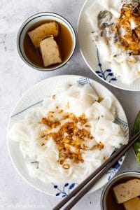 Banh cuon Thanh Tri, a must try food in Hanoi. Thin and delicate rice crepes topped with crispy fried shallots and served with dipping sauce.