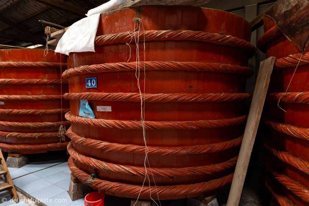 A huge wooden fish sauce barrel inside Red Boat factory in Phu Quoc, Vietnam