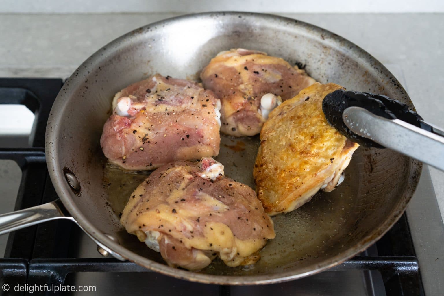 Pan Roasted Chicken Thighs with Crispy Skin Delightful Plate
