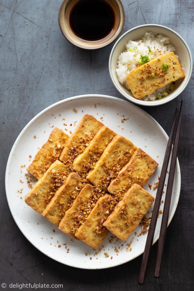 Vietnamese Lemongrass Chili Tofu (Dau Hu Chien Sa Ot) is a popular vegan Southern Vietnamese dish. Tofu is marinated with a lot of minced lemongrass and bird's eye chili before being fried until golden, crispy and fragrant.