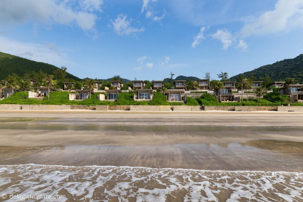 Two rows of villas along the beach at Six Senses Con Dao