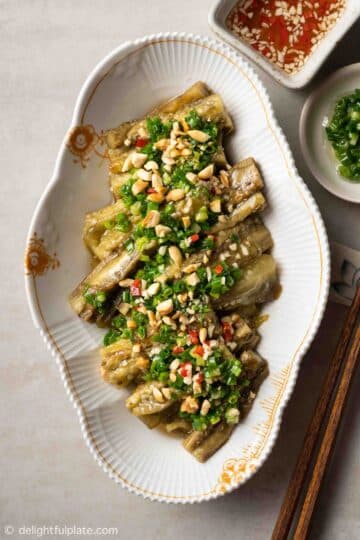 a plate of Vietnamese grilled eggplant with scallion oil