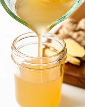 pour ginger syrup into a bottle
