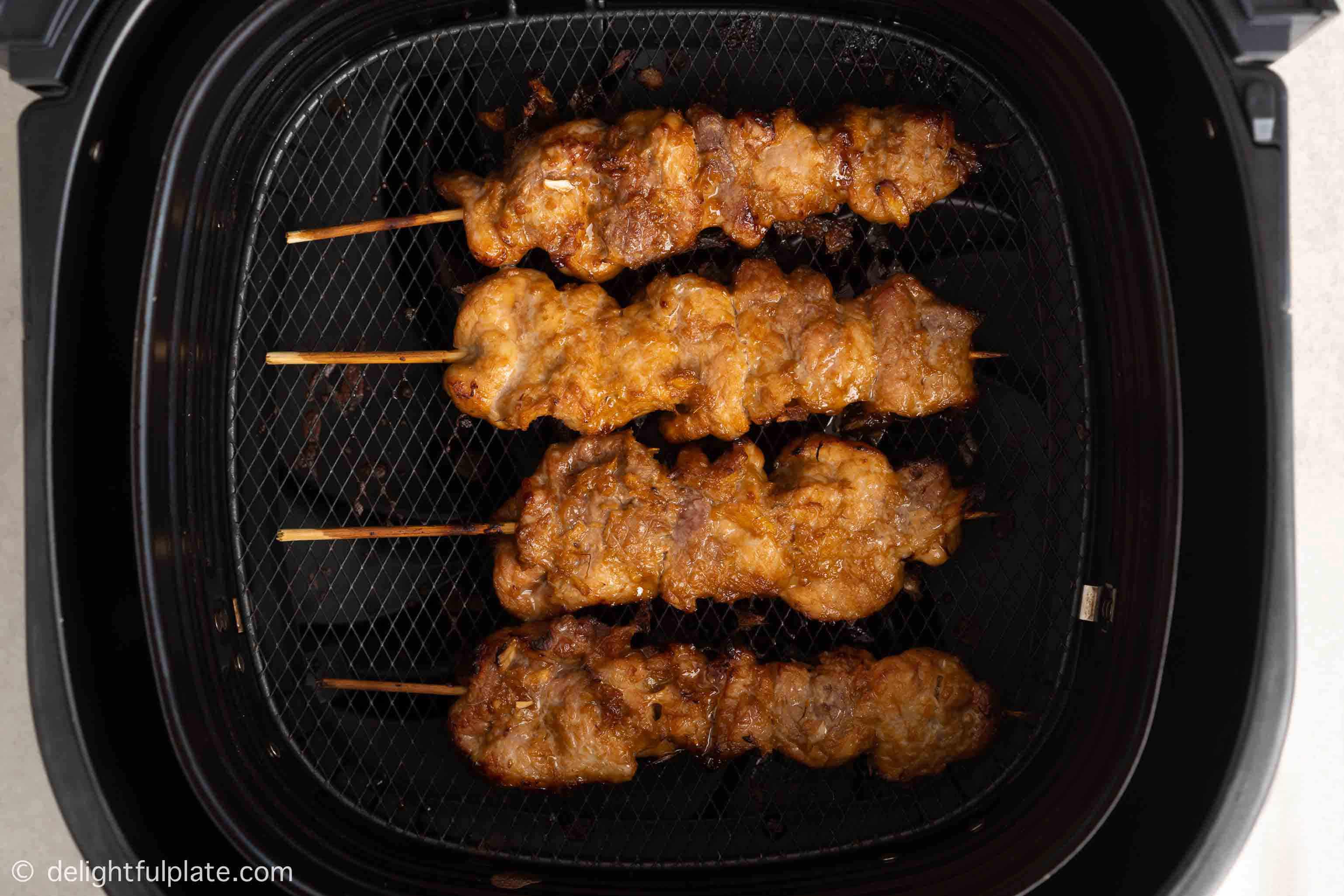 4 pork skewers in the air fryer basket