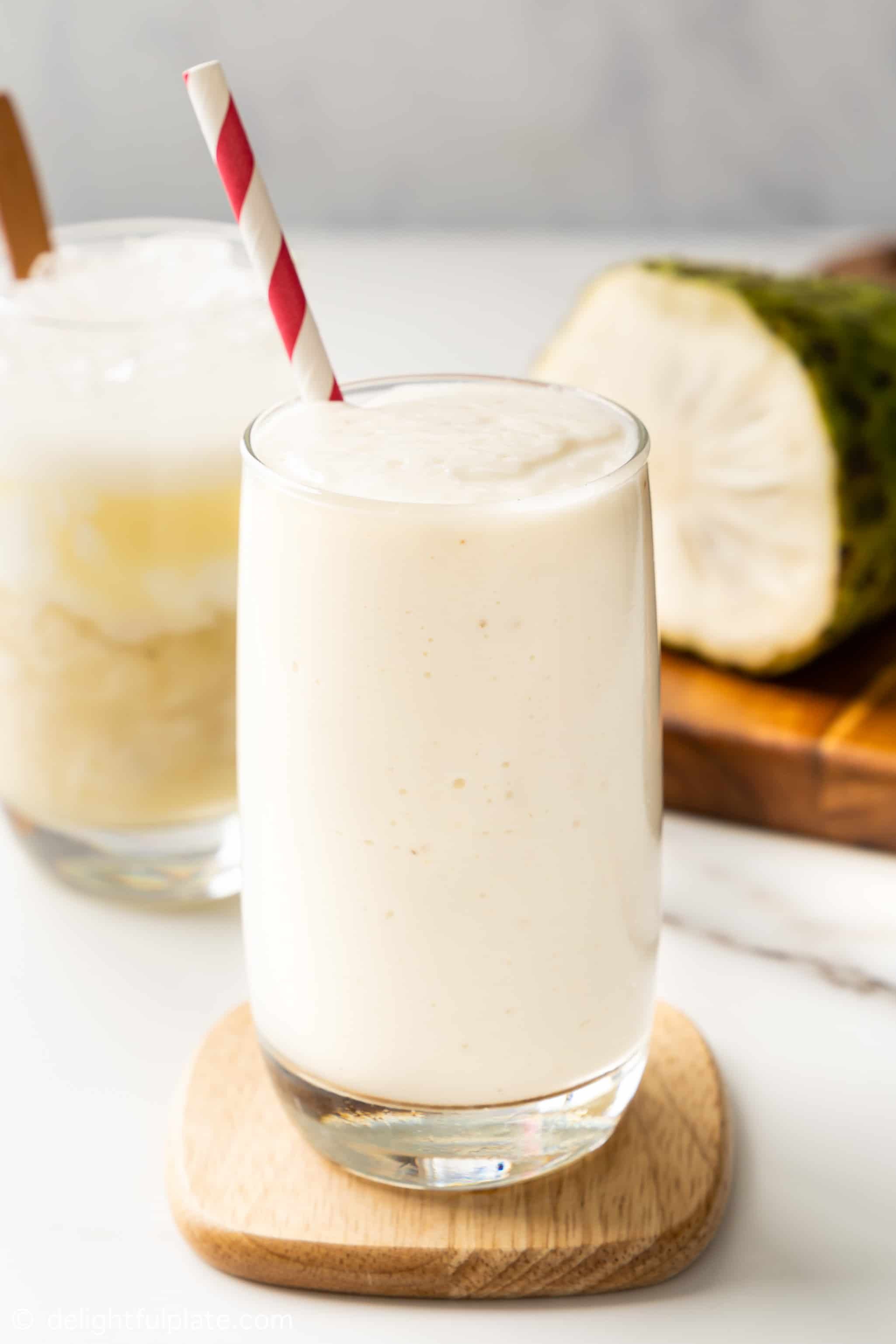 a glass of soursop smoothie