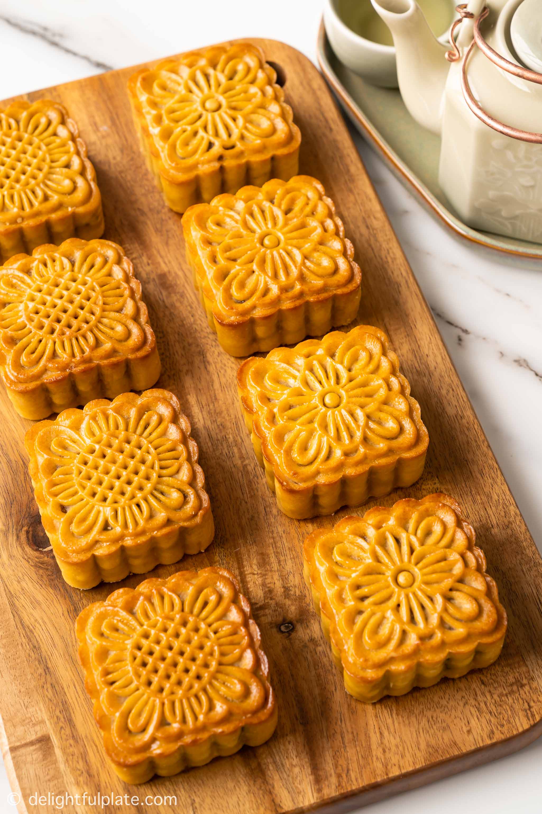 eight mooncakes on a tray