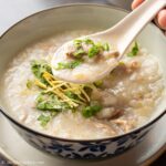 a bowl of duck congee
