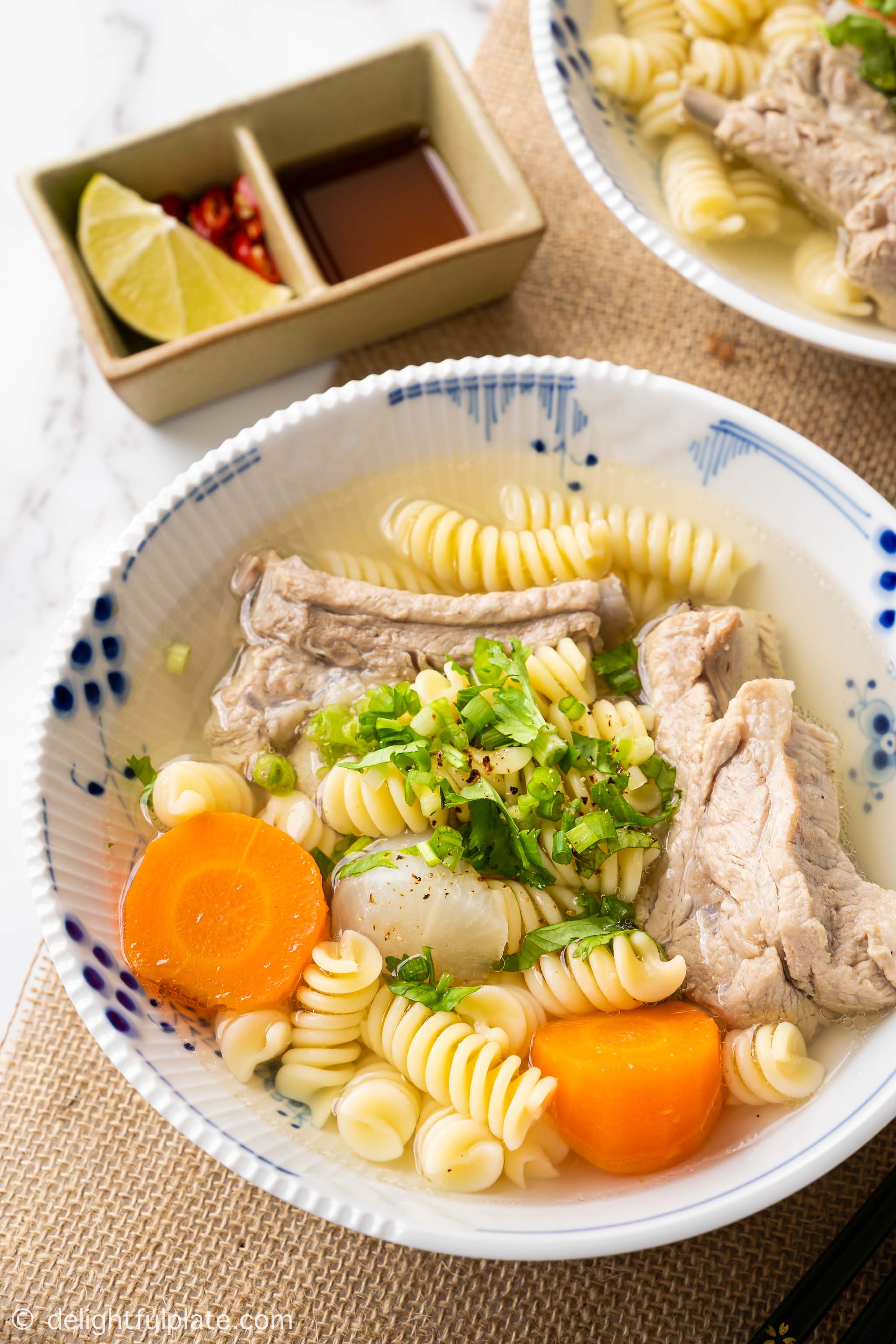 a bowl of Vietnamese pork macaroni soup