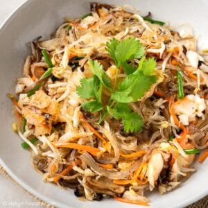 a bowl of Vietnamese crab cellophane noodles stir-fry (mien xao cua)
