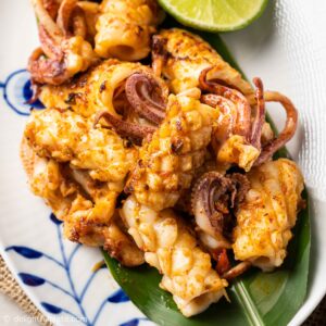 spicy grilled squid on a plate