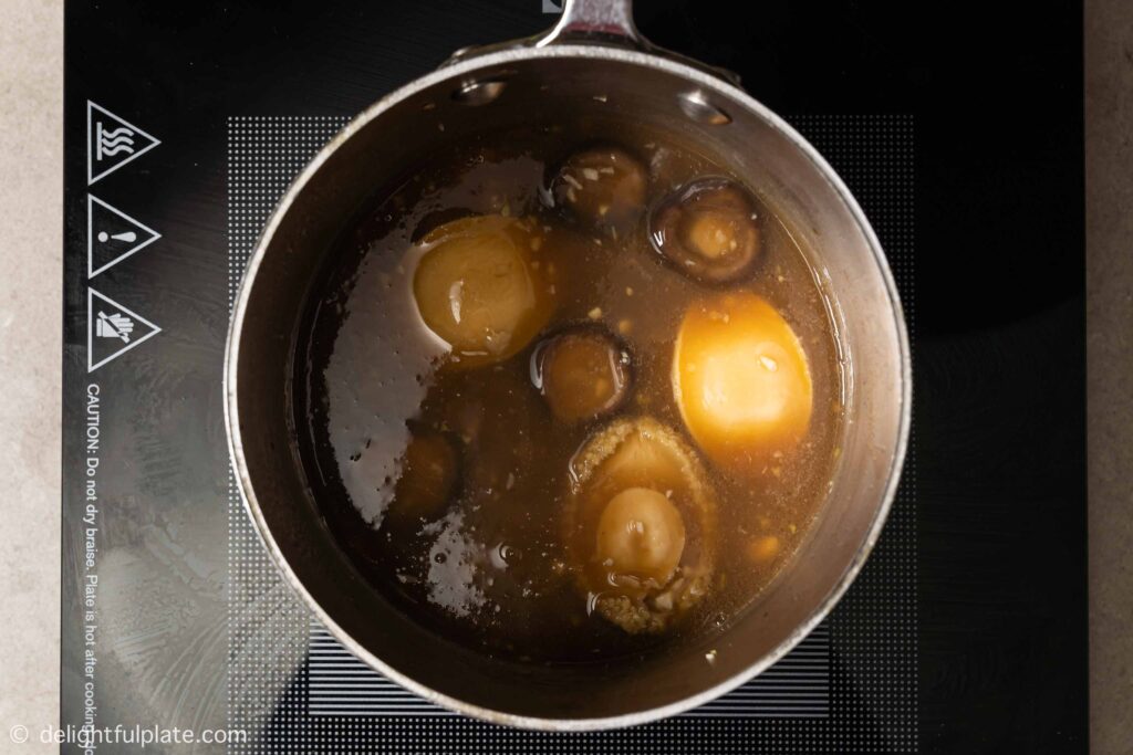 Braised Abalone and Broccoli in Oyster Sauce Delightful Plate
