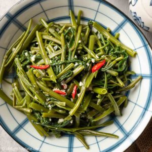 a plate of seasoned water spinach