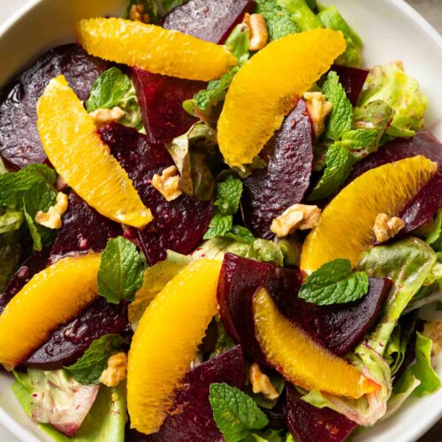 a plate of roasted beet and orange salad