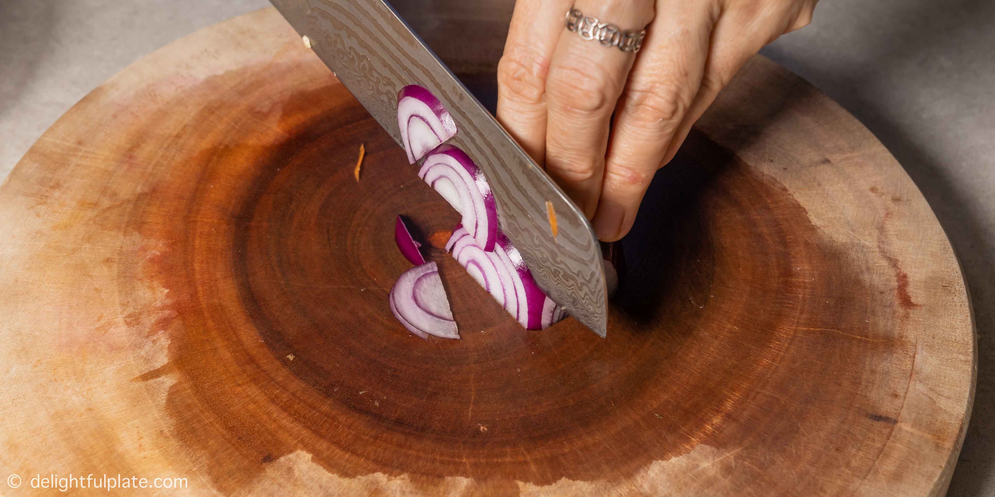 slicing red onion