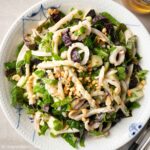 a plate of grilled squid salad (grilled calamari salad)