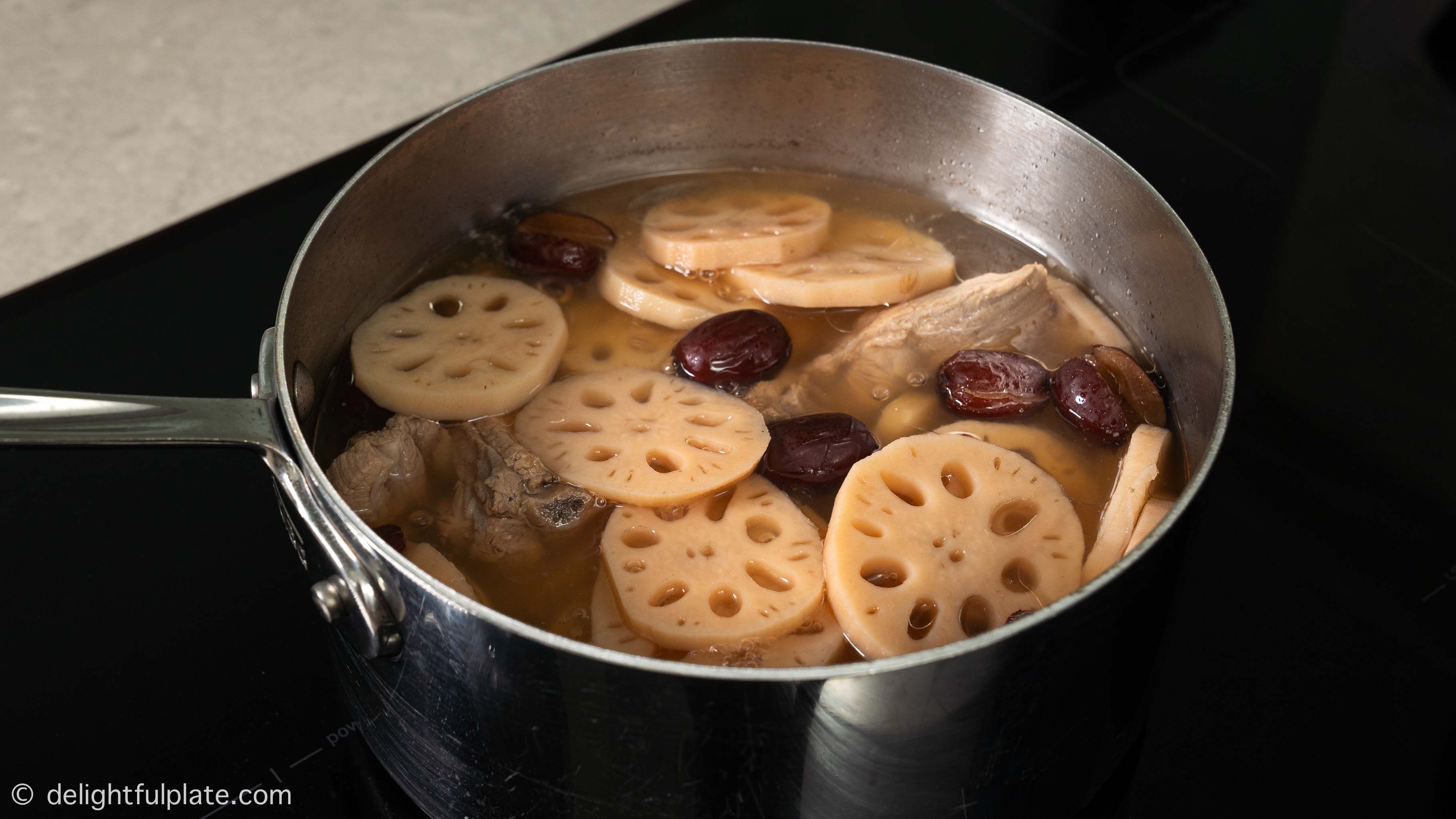 simmering lotus root and pork rib soup