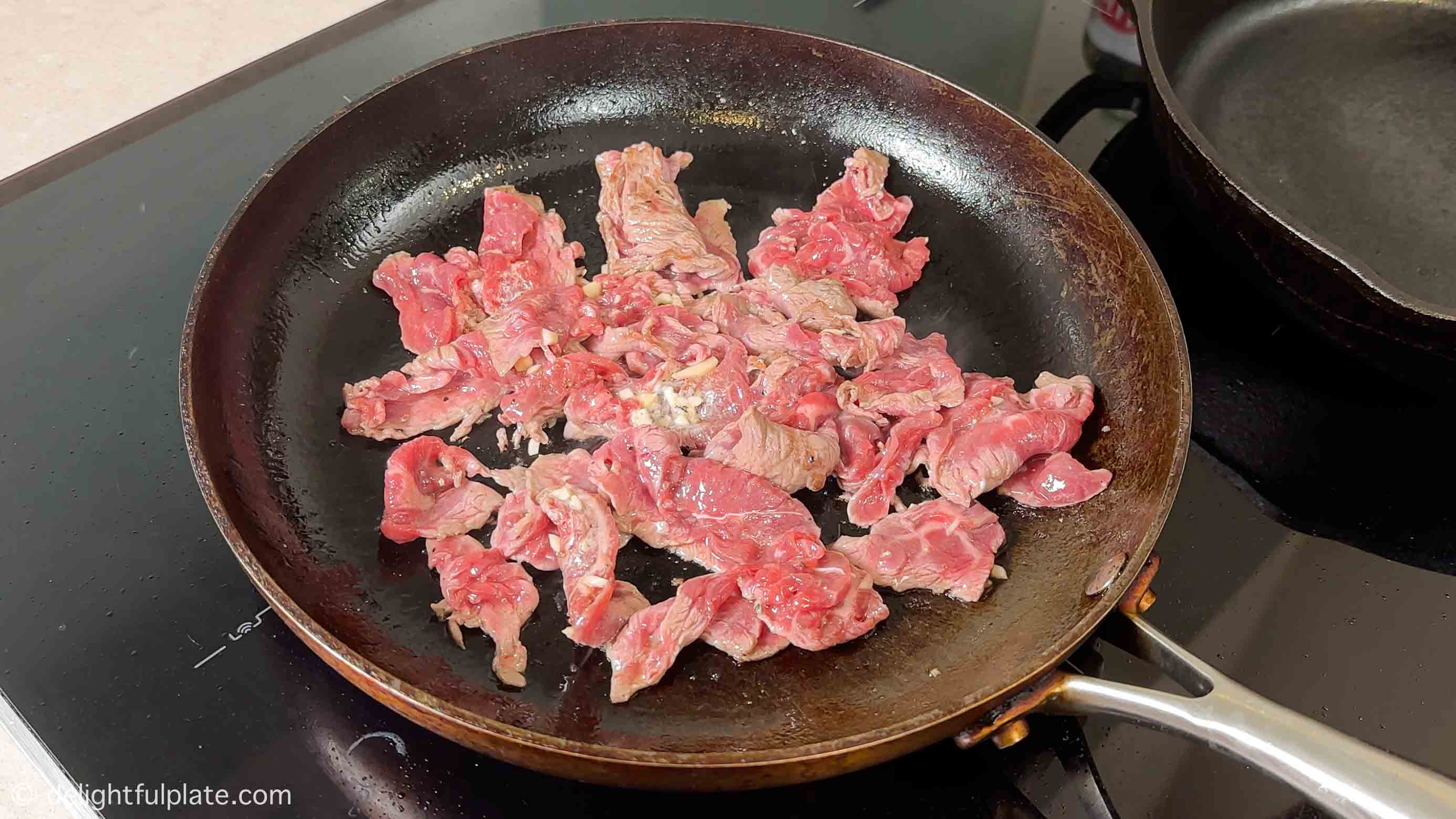 sauté beef in a skillet