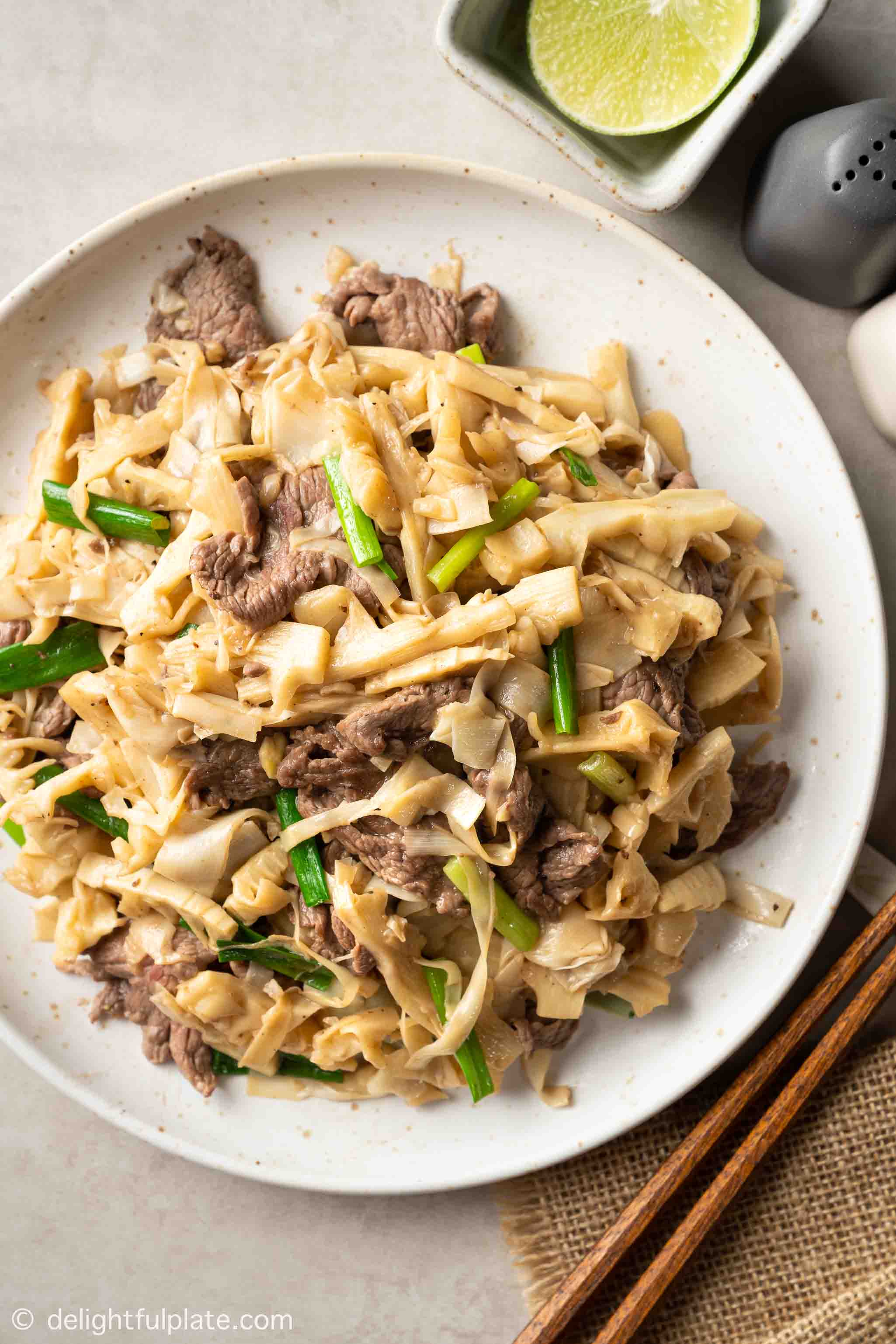 a plate of Vietnamese stir-fried beef with bamboo shoots