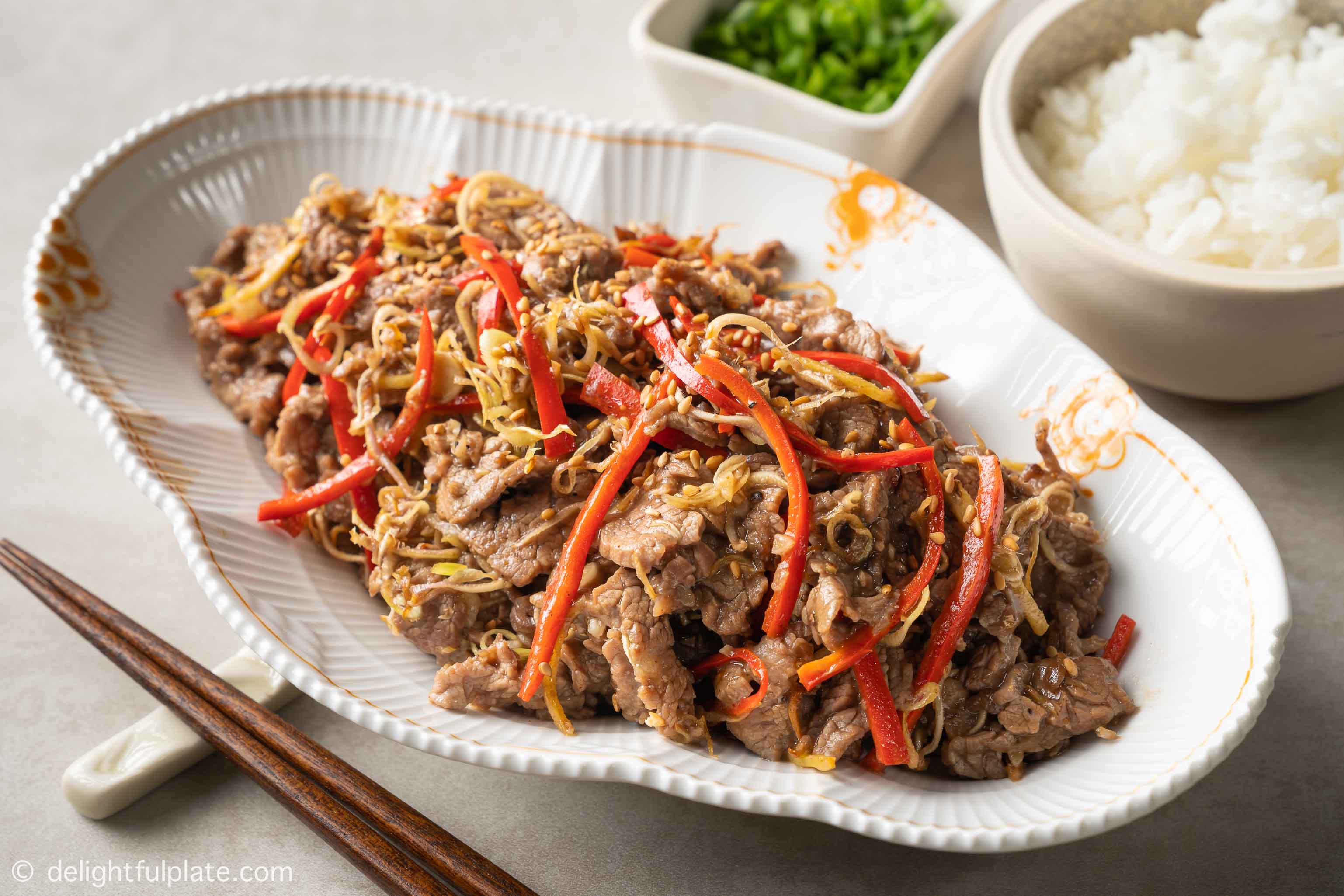 a plate of Vietnamese sautéed beef with lemongrass and chili