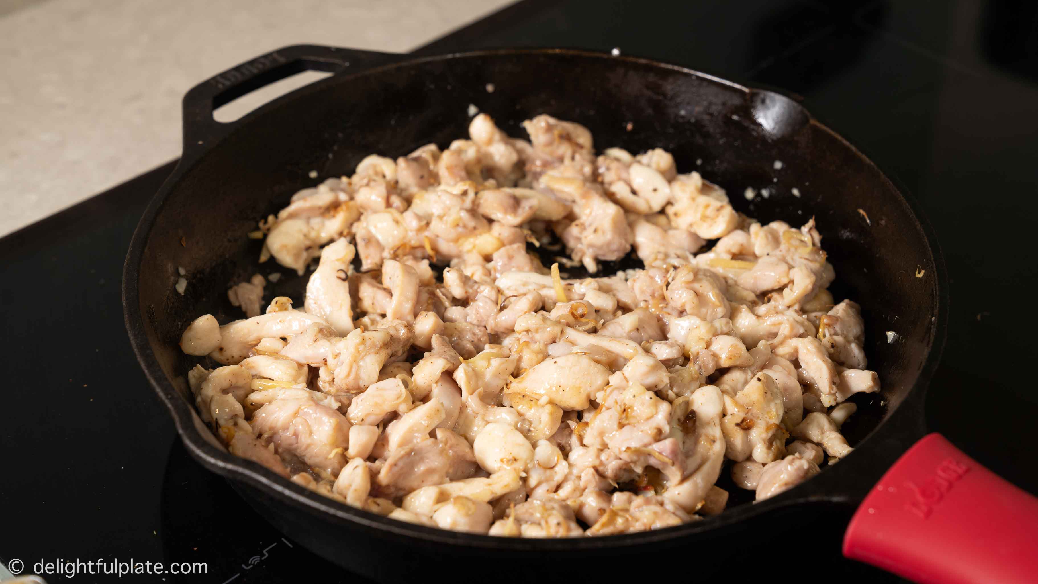 stir-fry chicken in the pan