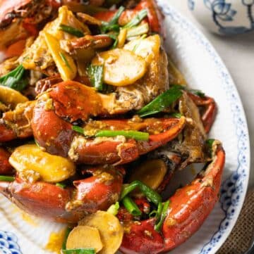 a plate of Vietnamese stir-fried crab with ginger and scallion (cua xao hanh gung).