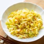 a plate of stir-fried cabbage with dried shrimp.