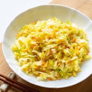 a plate of stir-fried cabbage with dried shrimp.