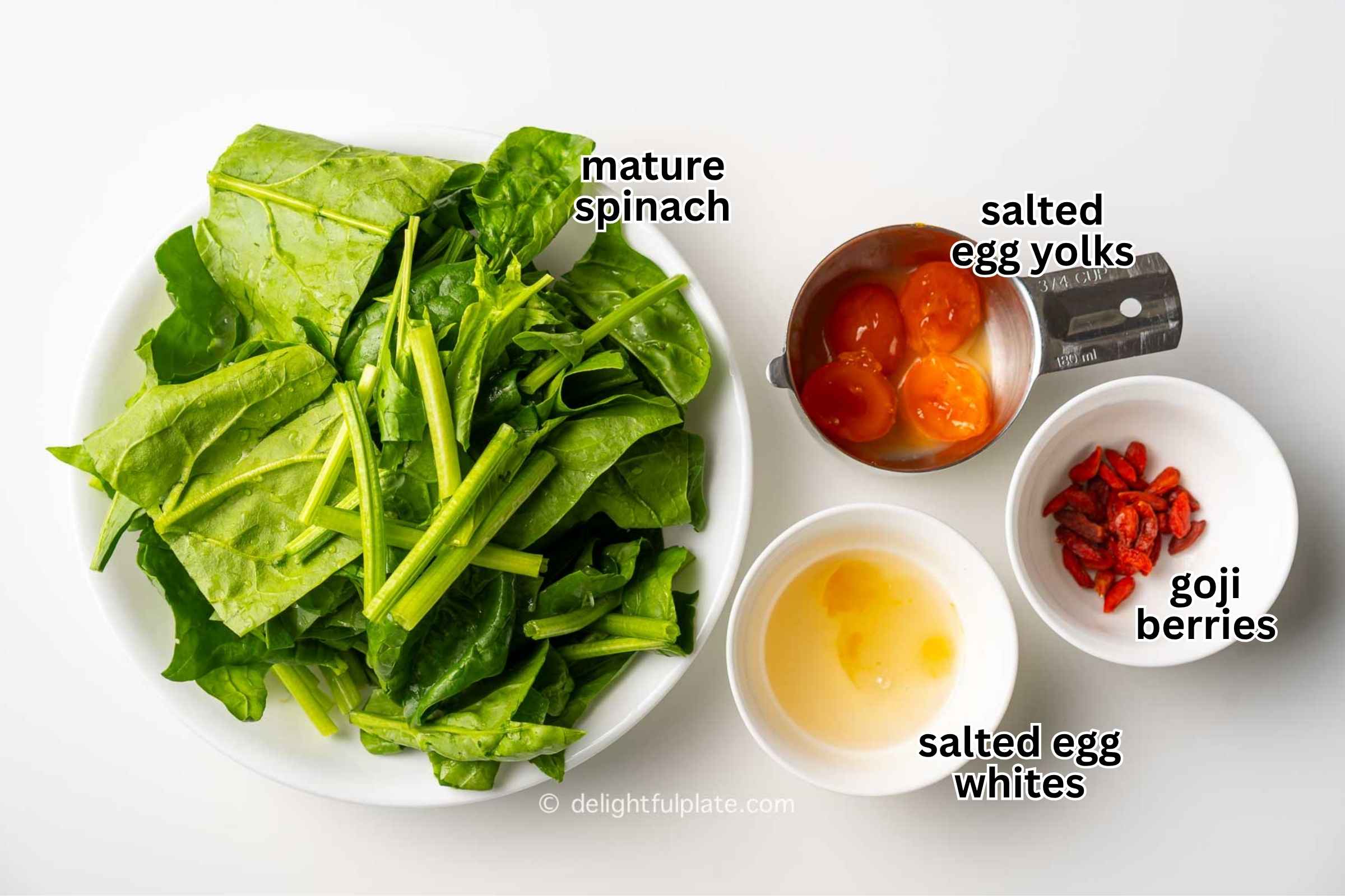 plates containing ingredients for the soup.